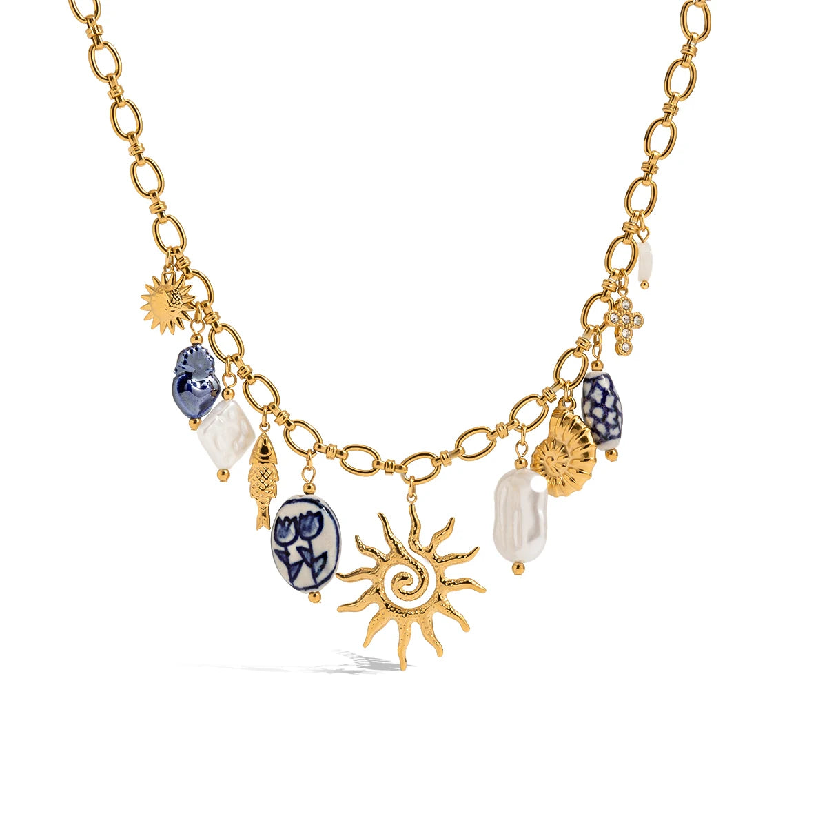 Gold sun charm necklace with pearl and ceramic pendants ocean inspired statement jewelry for women