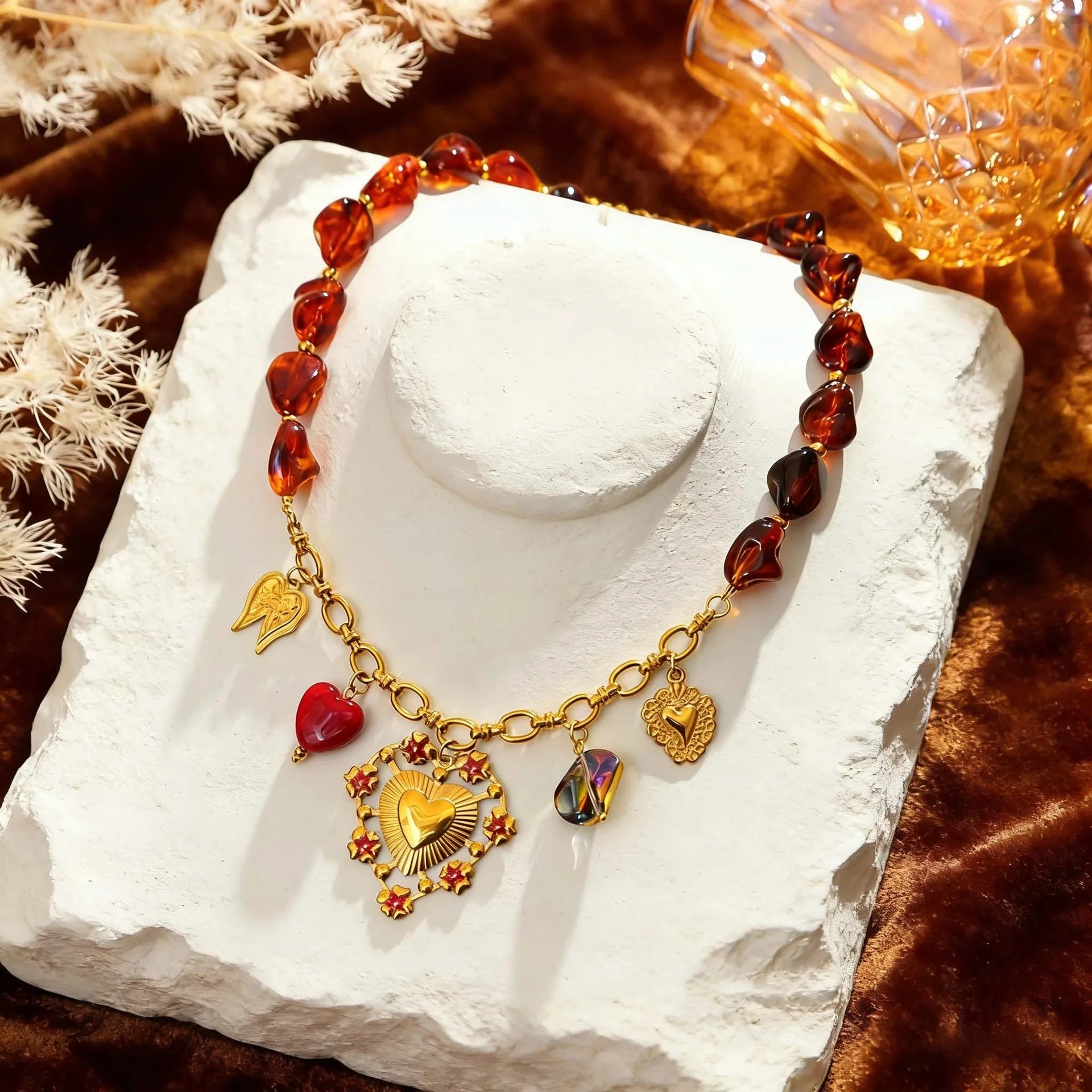 Bracelet with heart charms on a white stand with a blurred background